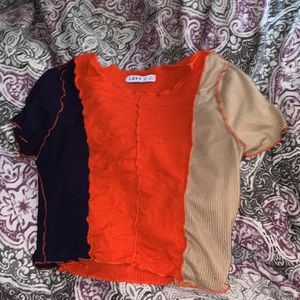 I’m selling a cropped split in 3 colors too; reddish-orange, blue and tan.